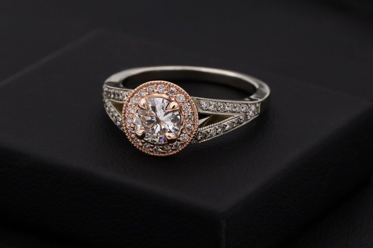 Diamond solitaire rings resting on silk